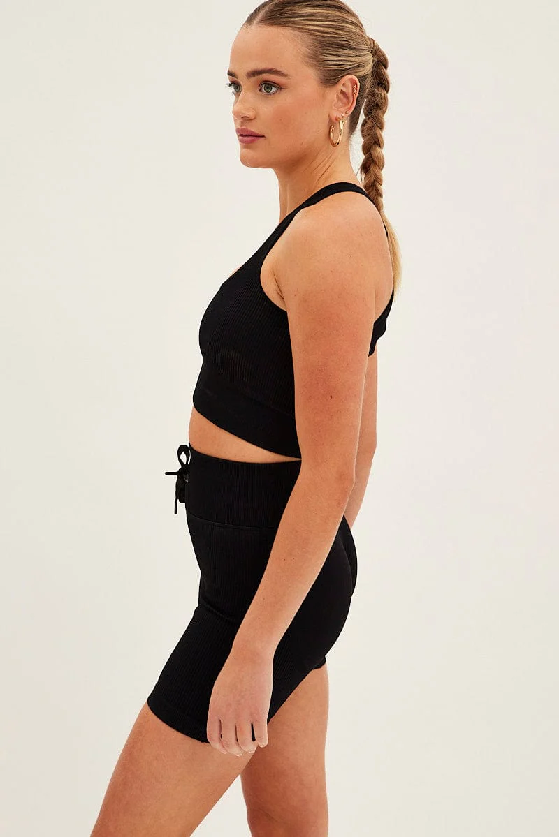 Black Seamless Halter Top And Bike Shorts Activewear Set - Image 4
