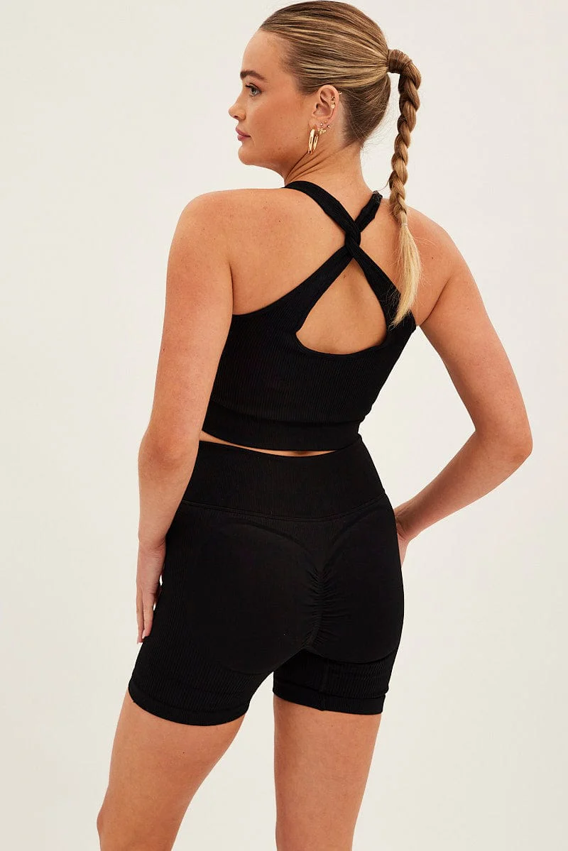 Black Seamless Halter Top And Bike Shorts Activewear Set - Image 5