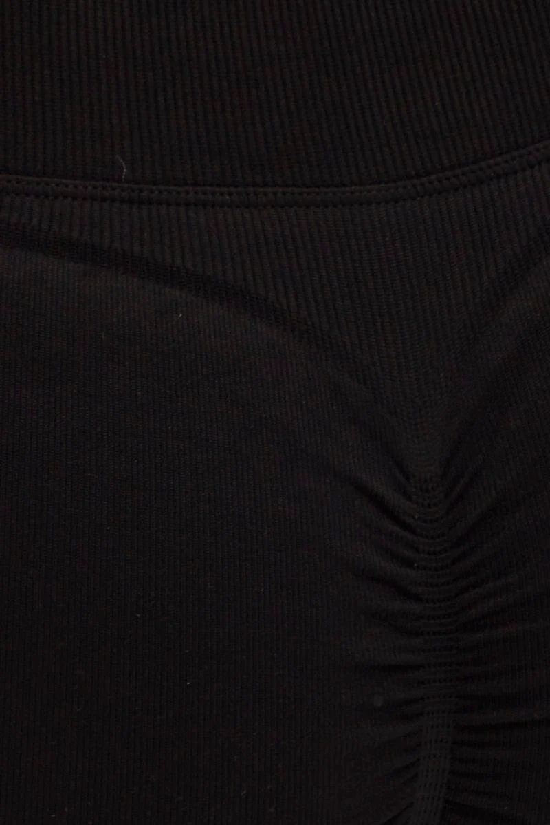 Black Seamless Halter Top And Bike Shorts Activewear Set - Image 6